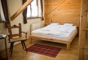 Postel nebo postele na pokoji v ubytování Révész Hotel, Restaurant and Rosa Spa