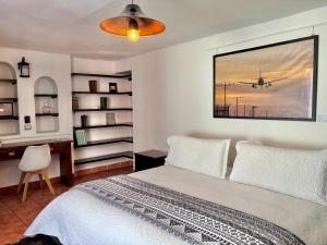 Hotel Boutique Casa Catalá客房内的一张或多张床位