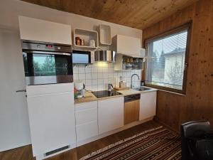 Kuchyň nebo kuchyňský kout v ubytování Im Wienerwald