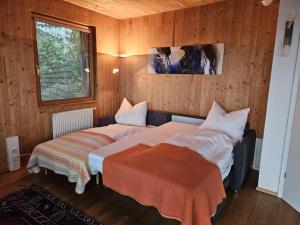 Postel nebo postele na pokoji v ubytování Im Wienerwald