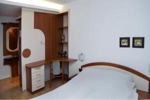 Postel nebo postele na pokoji v ubytování Gurko Hotel