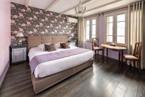 Postel nebo postele na pokoji v ubytování HOTEL ERMITAGE