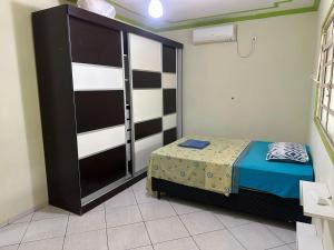 Postel nebo postele na pokoji v ubytování hostel oo de casa