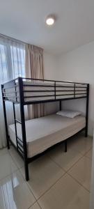 Ένα ή περισσότερα κρεβάτια σε δωμάτιο στο River Cloud Apartment Shared