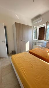 Postel nebo postele na pokoji v ubytování Villa Flavia + 37 fotografií