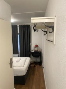 Postel nebo postele na pokoji v ubytování Lindis Hotel