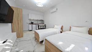 Postel nebo postele na pokoji v ubytování Villa Manuel + 4 fotografie