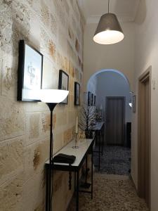 TV a/nebo společenská místnost v ubytování Casa vacanza vicino Ostuni e Torre Guaceto