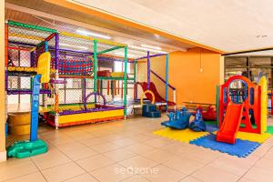 Resort pé na areia - Suítes JBVTOP的儿童俱乐部