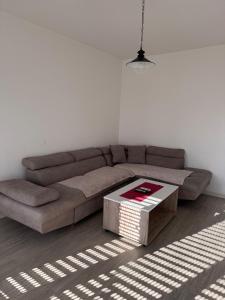 Posezení v ubytování DL Apartment