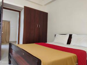 Postel nebo postele na pokoji v ubytování Lakshmibalajistayhome 1bhk&2bhk