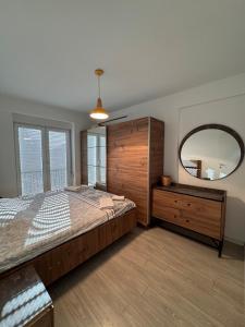Postel nebo postele na pokoji v ubytování DL Apartment