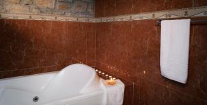 A bathroom at Klymeni Traditional Homes