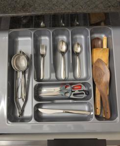 a tray with silver utensils and utensils sidx sidx sidx at Your Ultimate Edge Awaits! in Thane