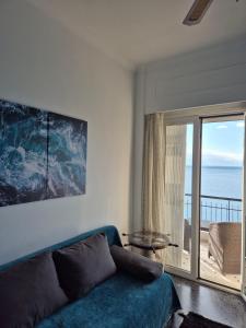 Posezení v ubytování Captain's home loutraki