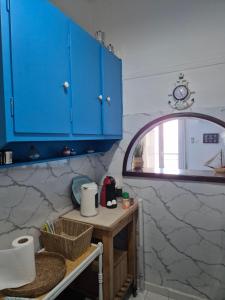 Kuchyň nebo kuchyňský kout v ubytování Captain's home loutraki