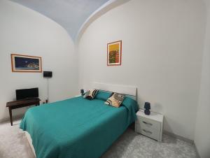 Ένα ή περισσότερα κρεβάτια σε δωμάτιο στο CASA ICARO - in the center of Amalfi