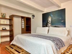 Hotel Boutique Casa Catalá客房内的一张或多张床位