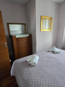 Posteľ alebo postele v izbe v ubytovaní Apartments Luana with private jacuzzi