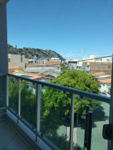 a balcony with a view of a city at Hotel Algaroba Anexo in Bom Jesus da Lapa
