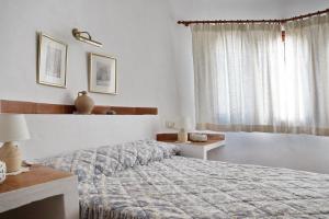 Ένα ή περισσότερα κρεβάτια σε δωμάτιο στο Adosado La racona, Las Rotas de Denia +14 φωτογραφίες