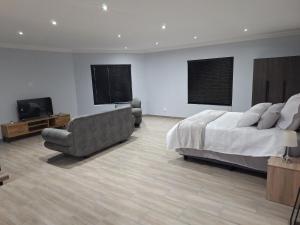 TV a/nebo společenská místnost v ubytování Skyline unit2