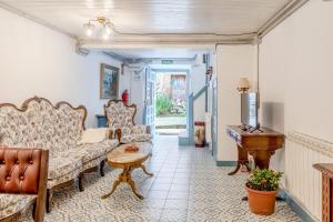 Posezení v ubytování Alojamientos Casa Luisa