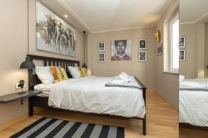 Posteľ alebo postele v izbe v ubytovaní Africa room old Town - Zadar