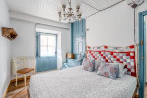 Postel nebo postele na pokoji v ubytování Alojamientos Casa Luisa