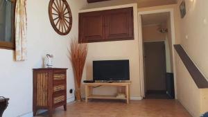 TV a/nebo společenská místnost v ubytování Location cap corse