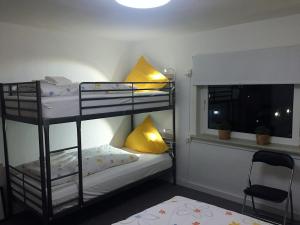 Postel nebo postele na pokoji v ubytování Appartement Winterberg Centrum 6 persoons