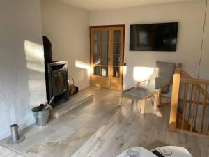 TV/trung tâm giải trí tại Schwedenhaus in Sandhatten +26 ảnh