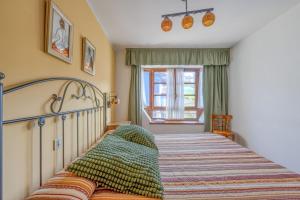 Postel nebo postele na pokoji v ubytování Alojamientos Casa Luisa