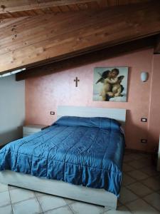 A bed or beds in a room at VILLA ANNAMARIA