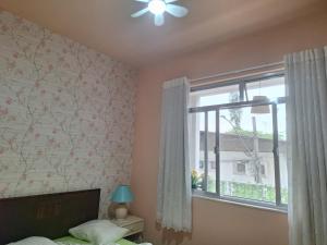 Postel nebo postele na pokoji v ubytování Apartamento Gracioso ao lado do Parque das Águas + 28 fotografií