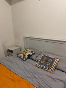 Ένα ή περισσότερα κρεβάτια σε δωμάτιο στο A casarella bella