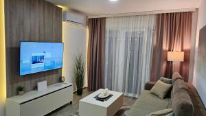TV a/nebo společenská místnost v ubytování Silver Dream 2