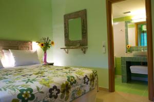 Postel nebo postele na pokoji v ubytování Exanthia Villas