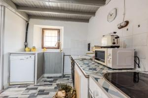 Kuchyň nebo kuchyňský kout v ubytování Alojamientos Casa Luisa
