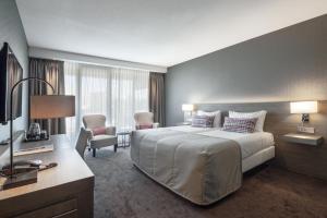 Postel nebo postele na pokoji v ubytování Van der Valk Hotel Haarlem