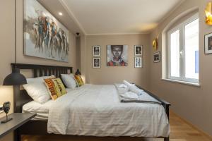 Posteľ alebo postele v izbe v ubytovaní Africa room old Town - Zadar