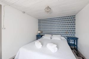 Postel nebo postele na pokoji v ubytování Alojamientos Casa Luisa