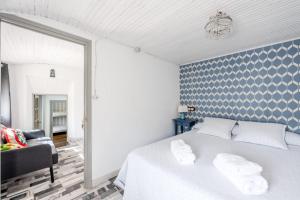 Postel nebo postele na pokoji v ubytování Alojamientos Casa Luisa
