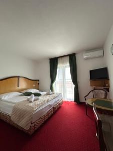 Postel nebo postele na pokoji v ubytování Hotel Bavaria Trogir