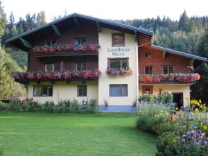 A garden outside Landhaus Alexa