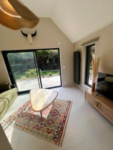 Posezení v ubytování Dépendance de charme entre Disney et Paris