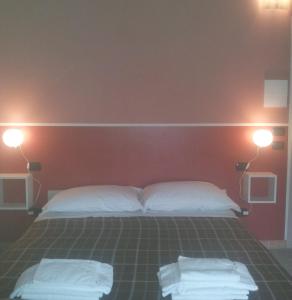 Postel nebo postele na pokoji v ubytování B&B Bianchi 64