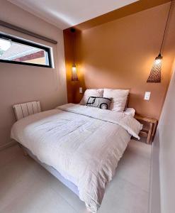 Postel nebo postele na pokoji v ubytování Dépendance de charme entre Disney et Paris