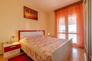 a bedroom with a bed and a window at House Vila Petra in Blato +14 photos