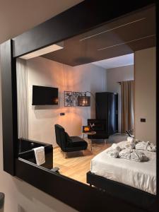 Eterna Suites Roma客房内的一张或多张床位